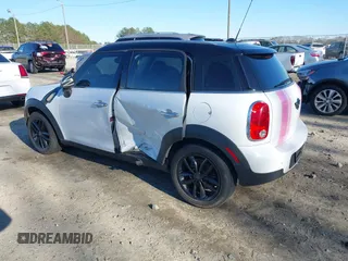 2012 MINI Countryman with VIN WMWZB3C50CWM30524, listed as a IAAI auction lot 41623400 with 194,858 mi miles and . Bid and sale history available at DreamBid. Image 3.