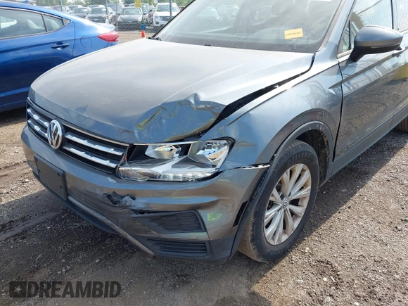 2018 Volkswagen Tiguan S with VIN 3VV0B7AX5JM108306, listed as a IAAI auction lot 42741783 with 71,040 mi miles and . Bid and sale history available at DreamBid. Image 6.