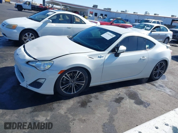 2015 Scion FR-S with VIN JF1ZNAA12F9709707, listed as a IAAI auction lot 41545940 with 107,575 mi miles. Bid and sale history available at carsss.com. Image 14.