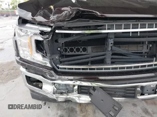 2019 Ford F-150 XL with VIN 1FTEW1CB6KKC92946, listed as a IAAI auction lot 41652249 with 133,883 mi miles and . Bid and sale history available at carsss.com. Image 6.