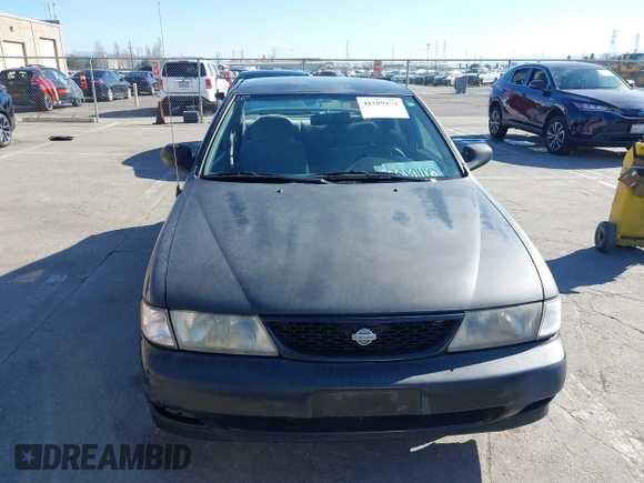 1998 Nissan Sentra XE z VIN 1N4AB41D8WC757796, wystawiony jako IAAI lot #41209171 z przebiegiem 160 108 mil mil oraz . Historia ofert i sprzedaży dostępna na DreamBid. Obrazek 12.