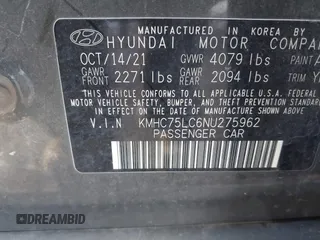 2022 Hyundai Ioniq SE with VIN KMHC75LC6NU275962, listed as a IAAI auction lot 41297650 with 28,274 mi miles and . Bid and sale history available at DreamBid. Image 9.