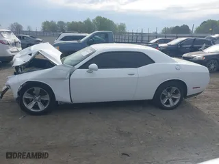 2017 Dodge Challenger SXT Plus with VIN 2C3CDZAG5HH658149, listed as a IAAI auction lot 41876762 with 128,126 mi miles. Bid and sale history available at carsss.com. Image 14.