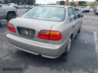 2000 Honda Civic DX with VIN 1HGEJ6625YL058339, listed as a IAAI auction lot 41521835 with 120,282 mi miles. Bid and sale history available at carsss.com. Image 4.