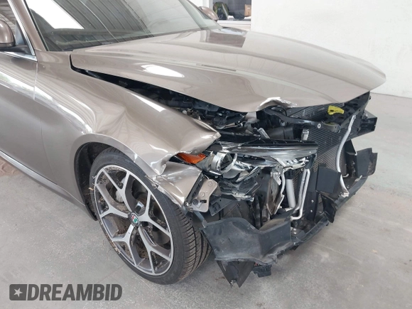 2019 Alfa Romeo Giulia Ti Sport with VIN ZARFAMBN1K7599269, listed as a IAAI auction lot 42271523 with 46,556 mi miles and . Bid and sale history available at DreamBid. Image 6.