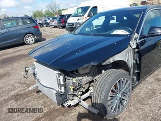 2021 BMW 2 Series 228i xDrive with VIN WBA73AK08M7J51154, listed as a IAAI auction lot 42168185 with 52,167 mi miles and . Bid and sale history available at DreamBid. Image 6.