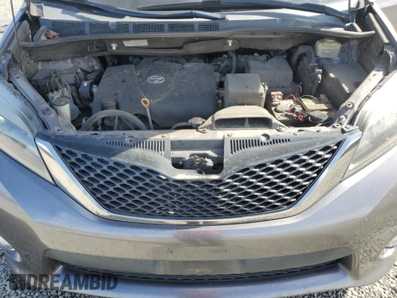 2017 Toyota Sienna SE with VIN 5TDXZ3DC0HS779855, listed as a Copart auction lot 56037865 with 95,959 mi miles and Salvage title. Bid and sale history available at DreamBid. Image 12.