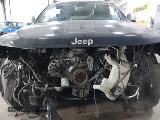 2013 Jeep Grand Cherokee Overland with VIN 1C4RJFCT7DC524005, listed as a IAAI auction lot 42116097 with 126,942 mi miles. Bid and sale history available at carsss.com. Image 6.