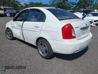 2009 Hyundai Accent Auto GLS with VIN KMHCN46C19U368700, listed as a IAAI auction lot 41590180 with 165,836 mi miles. Bid and sale history available at carsss.com. Image 3.
