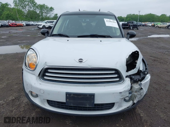 2013 MINI Countryman with VIN WMWZB3C53DWM08244, listed as a IAAI auction lot 42281364 with 139,894 mi miles and . Bid and sale history available at DreamBid. Image 12.