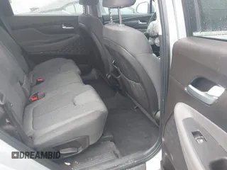 2019 Hyundai Santa Fe SE z VIN 5NMS23AD4KH130517, wystawiony jako IAAI lot #42324854 z przebiegiem 76 963 mil mil oraz . Historia ofert i sprzedaży dostępna na DreamBid. Obrazek 8.