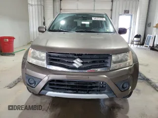 2013 Suzuki Grand Vitara Premium z VIN JS3TE0D60D4100323, wystawiony jako Copart lot #59333335 z przebiegiem 102 368 mil mil oraz Szkoda całkowita • Salvage title. Historia ofert i sprzedaży dostępna na DreamBid. Obrazek 5.