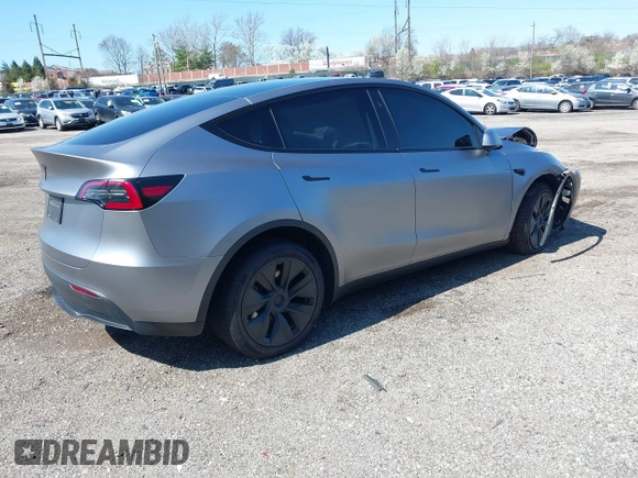 2024 Tesla Model Y Long Range with VIN 7SAYGDEE2RA311261, listed as a IAAI auction lot 41534010 with Not Provided miles and . Bid and sale history available at DreamBid. Image 4.