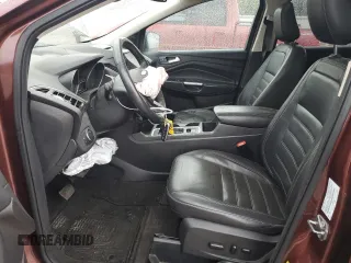 2018 Ford Escape Titanium z VIN 1FMCU0J93JUA70449, wystawiony jako Copart lot #59303245 z przebiegiem 165 907 mil mil oraz Szkoda całkowita • Salvage title. Historia ofert i sprzedaży dostępna na DreamBid. Obrazek 7.
