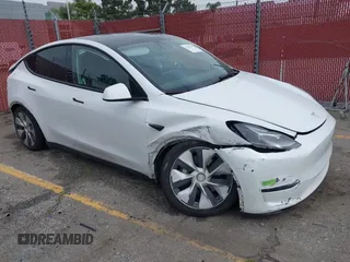 2023 Tesla Model Y Long Range with VIN 7SAYGAEE9PF702910, listed as a IAAI auction lot 42199519 with 91,094 mi miles and . Bid and sale history available at DreamBid. Image 1.