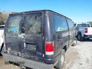 1999 Ford Econoline Cargo with VIN 1FTRE1422XHA33460, listed as a IAAI auction lot 41326443 with 119,294 mi miles. Bid and sale history available at carsss.com. Image 4.