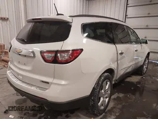 2017 Chevrolet Traverse Premier with VIN 1GNKVJKD9HJ340891, listed as a IAAI auction lot 41601595 with 96,647 mi miles and . Bid and sale history available at DreamBid. Image 4.