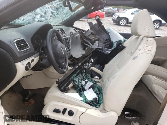 2013 Volkswagen Eos Komfort with VIN WVWBW8AH1DV006523, listed as a Copart auction lot 52037965 with 77,746 mi miles and Salvage Title. Bid and sale history available at DreamBid. Image 7.