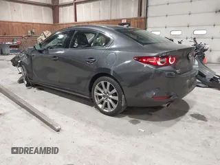 2020 Mazda 3 Premium with VIN 3MZBPBEM3LM123091, listed as a IAAI auction lot 41568213 with 68,515 mi miles and . Bid and sale history available at DreamBid. Image 3.