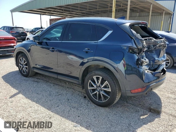 2018 Mazda CX-5 Grand Touring с VIN JM3KFBDM8J0344328, выставлен на аукционе Copart как лот 57665175 с пробегом 131 175 миль миль и Списание • Salvage title. История ставок и продаж доступна на DreamBid. Изображение 2.