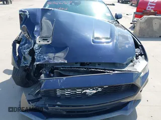 2021 Ford Mustang EcoBoost with VIN 1FA6P8TH7M5134461, listed as a IAAI auction lot 42526727 with 56,494 mi miles and . Bid and sale history available at DreamBid. Image 6.