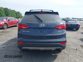 2016 Hyundai Santa Fe z VIN 5XYZU3LB4GG308030, wystawiony jako IAAI lot #42102832 z przebiegiem Nie podano mil oraz . Historia ofert i sprzedaży dostępna na DreamBid. Obrazek 15.