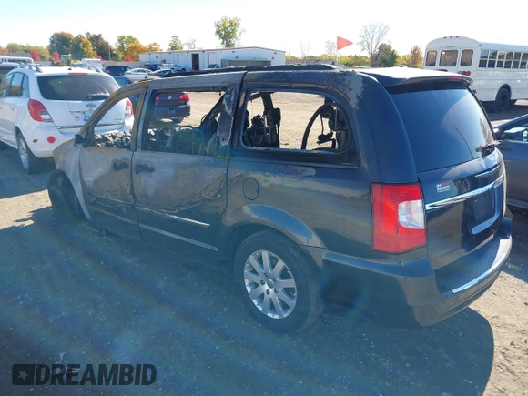 2014 Chrysler Town & Country Touring with VIN 2C4RC1BGXER112283, listed as a IAAI auction lot 40593456 with Not Provided miles and . Bid and sale history available at DreamBid. Image 3.