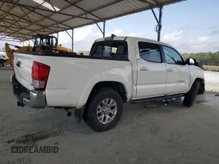 2016 Toyota Tacoma SR with VIN 5TFCZ5AN9GX014233, listed as a Copart auction lot 52016485 with 260,017 mi miles and Salvage Title. Bid and sale history available at carsss.com. Image 3.