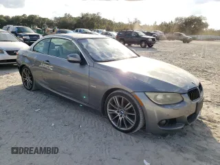 2011 BMW 3 Series 335i with VIN WBADX7C5XBE580244, listed as a Copart auction lot 44993215 with 124,091 mi miles and Salvage Title. Bid and sale history available at carsss.com. Image 4.