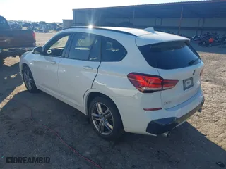2021 BMW X1 xDrive28i with VIN WBXJG9C04M5S84454, listed as a IAAI auction lot 41373515 with 45,030 mi miles. Bid and sale history available at carsss.com. Image 3.