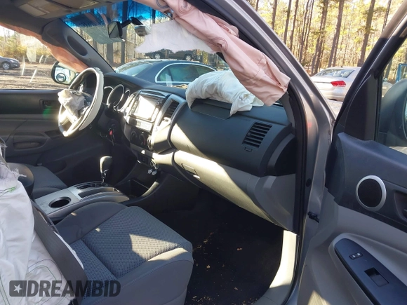 2015 Toyota Tacoma PreRunner z VIN 3TMJU4GNXFM191580, wystawiony jako IAAI lot #41216357 z przebiegiem 78 490 mil mil oraz . Historia ofert i sprzedaży dostępna na DreamBid. Obrazek 5.