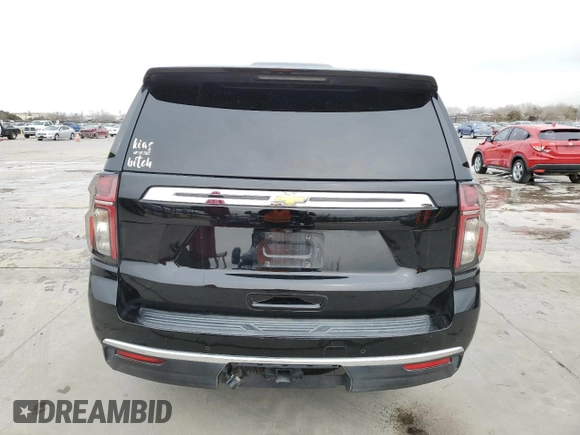 2021 Chevrolet Suburban LS with VIN 1GNSCBKD0MR379571, listed as a Copart auction lot 42579275 with 146,655 mi miles and Salvage Title. Bid and sale history available at DreamBid. Image 6.