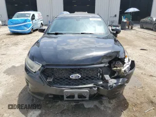 2014 Ford Police Interceptor with VIN 1FAHP2MT2EG161579, listed as a Copart auction lot 53878845 with 205,031 mi miles and Salvage title. Bid and sale history available at DreamBid. Image 5.