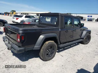 2021 Jeep Gladiator Freedom с VIN 1C6HJTAG4ML580023, выставлен на аукционе Copart как лот 57586475 с пробегом 64 022 миль миль и Списание • Salvage title. История ставок и продаж доступна на DreamBid. Изображение 3.