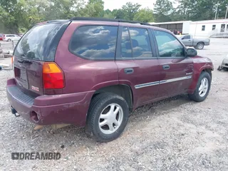 2006 GMC Envoy SLT with VIN 1GKDS13S262181019, listed as a IAAI auction lot 40130930 with 190,525 mi miles. Bid and sale history available at carsss.com. Image 4.