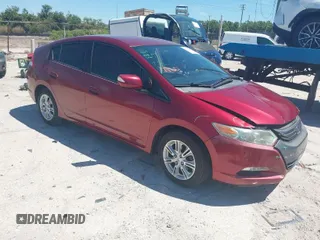 2010 Honda Insight EX with VIN JHMZE2H71AS021062, listed as a IAAI auction lot 41857350 with 45,558 mi miles and . Bid and sale history available at carsss.com. Image 1.