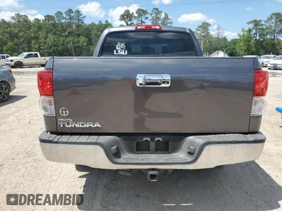 2013 Toyota Tundra z VIN 5TFEM5F13DX060407, wystawiony jako Copart lot #56906595 z przebiegiem 226 651 mil mil oraz Szkoda całkowita • Salvage title. Historia ofert i sprzedaży dostępna na DreamBid. Obrazek 6.