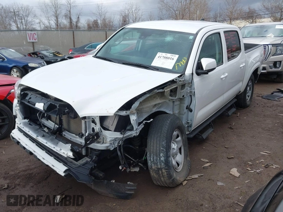 2022 Toyota Tacoma SR with VIN 3TMCZ5ANXNM457736, listed as a IAAI auction lot 41708016 with 44,351 mi miles and . Bid and sale history available at DreamBid. Image 2.
