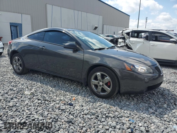 2007 Pontiac G6 GT with VIN 1G2ZH18NX74127920, listed as a Copart auction lot 52950365 with 127,428 mi miles and Salvage title. Bid and sale history available at DreamBid. Image 4.