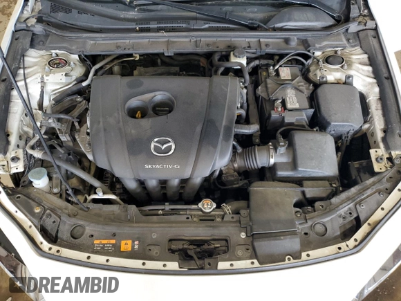 2019 Mazda 3 z VIN 3MZBPABL4KM114291, wystawiony jako Copart lot #57652945 z przebiegiem 148 644 mil mil oraz Szkoda całkowita • Salvage title. Historia ofert i sprzedaży dostępna na DreamBid. Obrazek 11.