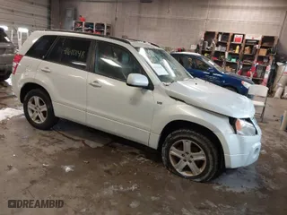 2006 Suzuki Grand Vitara Luxury with VIN JS3TD947764101438, listed as a IAAI auction lot 41610148 with 172,483 mi miles. Bid and sale history available at carsss.com. Image 1.