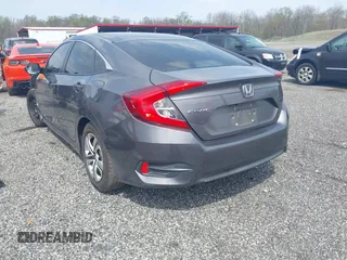 2016 Honda Civic Sedan LX with VIN 2HGFC2F51GH524197, listed as a IAAI auction lot 42012886 with 103,302 mi miles. Bid and sale history available at carsss.com. Image 3.