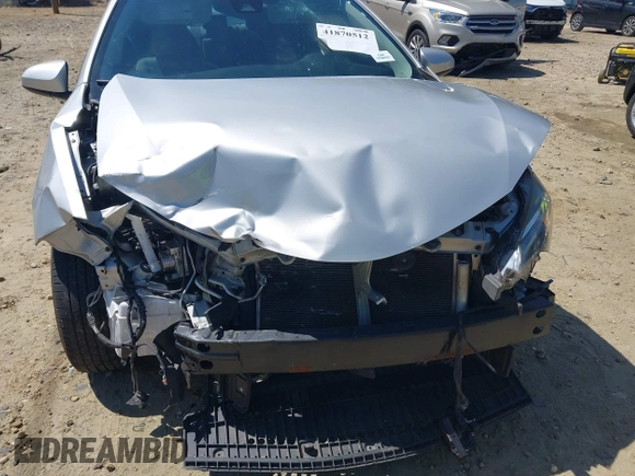 2019 Toyota Corolla L with VIN 2T1BURHEXKC163703, listed as a IAAI auction lot 41870512 with 131,153 mi miles. Bid and sale history available at carsss.com. Image 6.