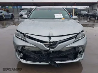 2020 Toyota Camry LE with VIN 4T1C11AK1LU382855, listed as a IAAI auction lot 41427509 with 118,594 mi miles. Bid and sale history available at carsss.com. Image 6.