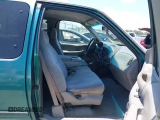 1998 Ford F-150 with VIN 1FTZX17W3WKB90294, listed as a IAAI auction lot 42676059 with 119,629 mi miles and . Bid and sale history available at DreamBid. Image 5.