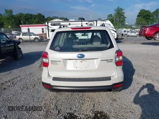 2015 Subaru Forester 2.5i with VIN JF2SJABC1FH557918, listed as a IAAI auction lot 42645355 with 288,345 mi miles and . Bid and sale history available at DreamBid. Image 16.