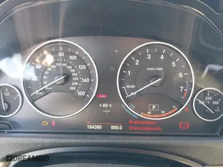 2014 BMW 4 Series 428i xDrive with VIN WBA3N5C55EK196898, listed as a IAAI auction lot 42112580 with 184,381 mi miles. Bid and sale history available at carsss.com. Image 7.