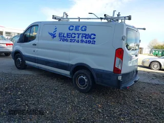 2015 Ford Transit Cargo with VIN 1FTYE1YM0FKB31248, listed as a IAAI auction lot 41703474 with 238,925 mi miles and . Bid and sale history available at DreamBid. Image 3.
