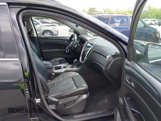 2014 Cadillac SRX with VIN 3GYFNAE30ES641616, listed as a IAAI auction lot 42000120 with 145,000 mi miles and . Bid and sale history available at DreamBid. Image 5.