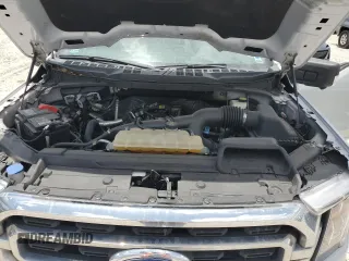2021 Ford F-150 XL with VIN 1FTEW1CP2MKE62928, listed as a Copart auction lot 59882525 with 32,481 mi miles and Salvage title. Bid and sale history available at DreamBid. Image 11.